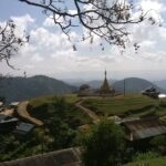 a group of buildings on a hill